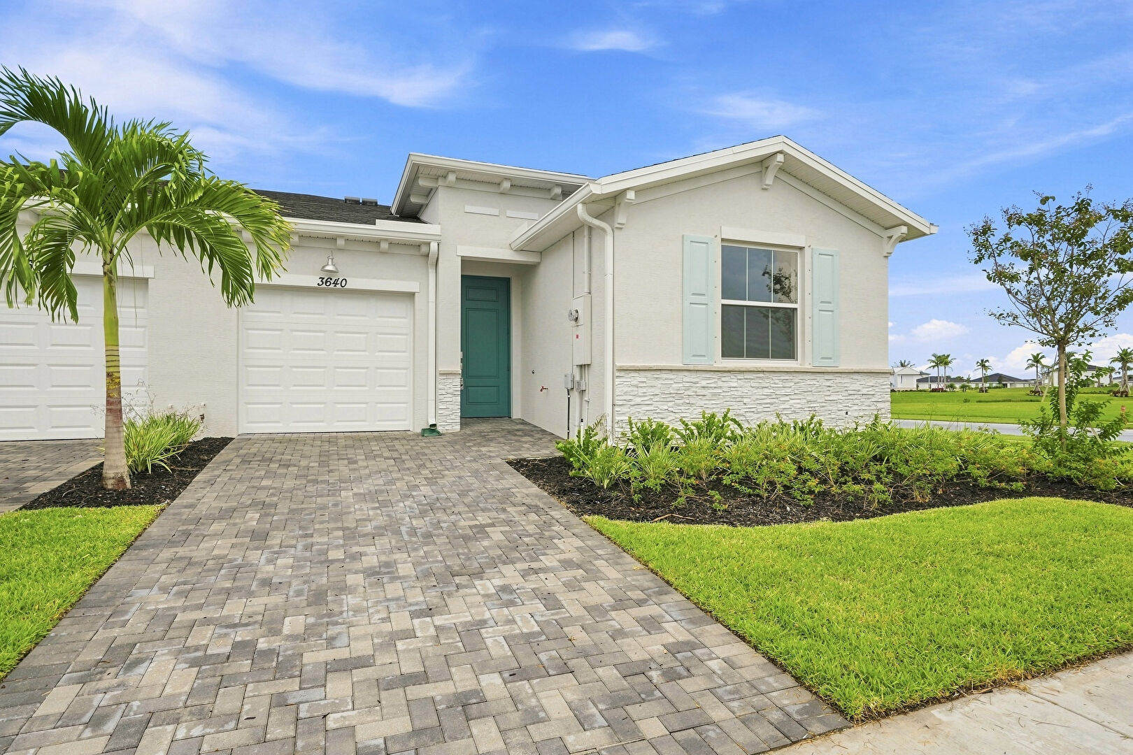Exterior Entry at 3640 Spanish Cedar Place, Fort Pierce, FL 34946, listed by Ravi Mohanka
