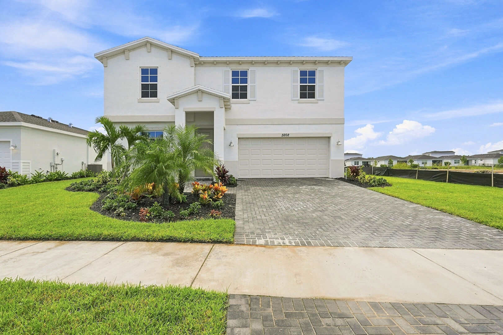 Front at 3202 Spanish Cedar Place, Fort Pierce, FL 34946, listed by Ravi Mohanka