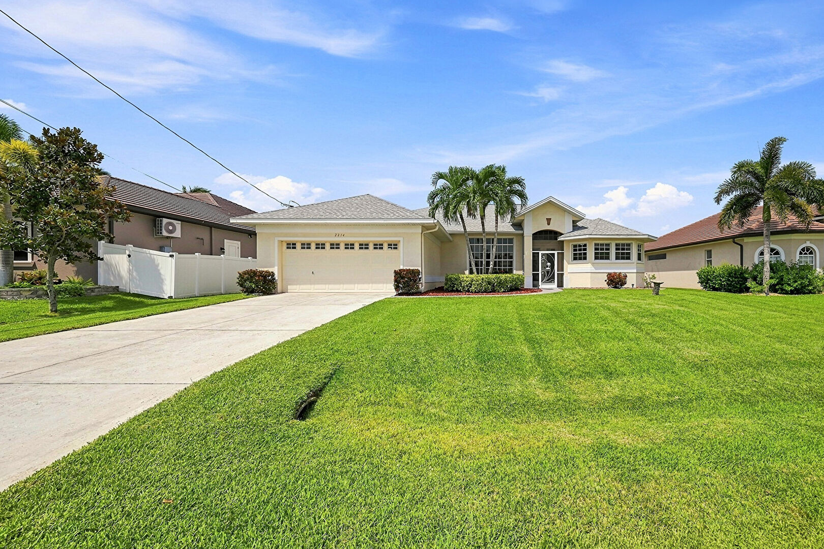 Front at 2214 Southeast 19th Place, Cape Coral, FL 33990, listed by Brett Crume