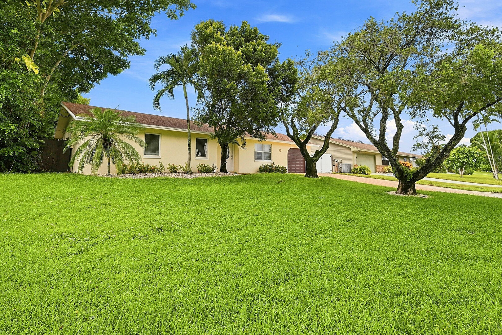 Front yard at 3606 Dorrit Avenue, Boynton Beach, FL 33436, listed by Rachael Barach