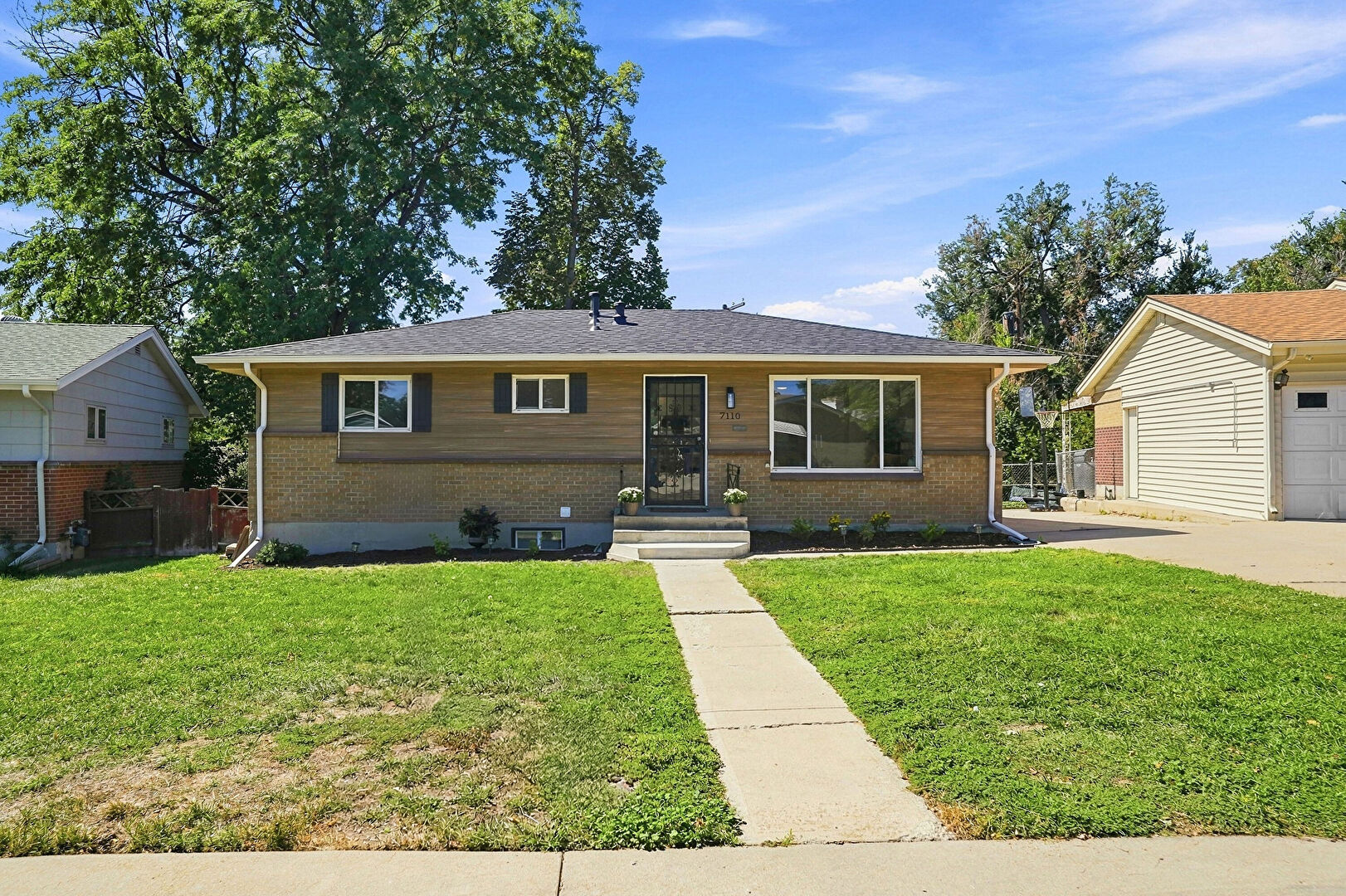 Front at 7110 West Iowa Avenue, Lakewood, CO 80232, listed by Danielle Marcus
