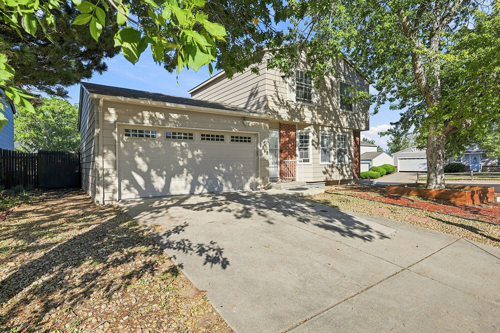 Front at 4848 South Pitkin Way, Aurora, CO 80015, listed by Azam Aslamy
