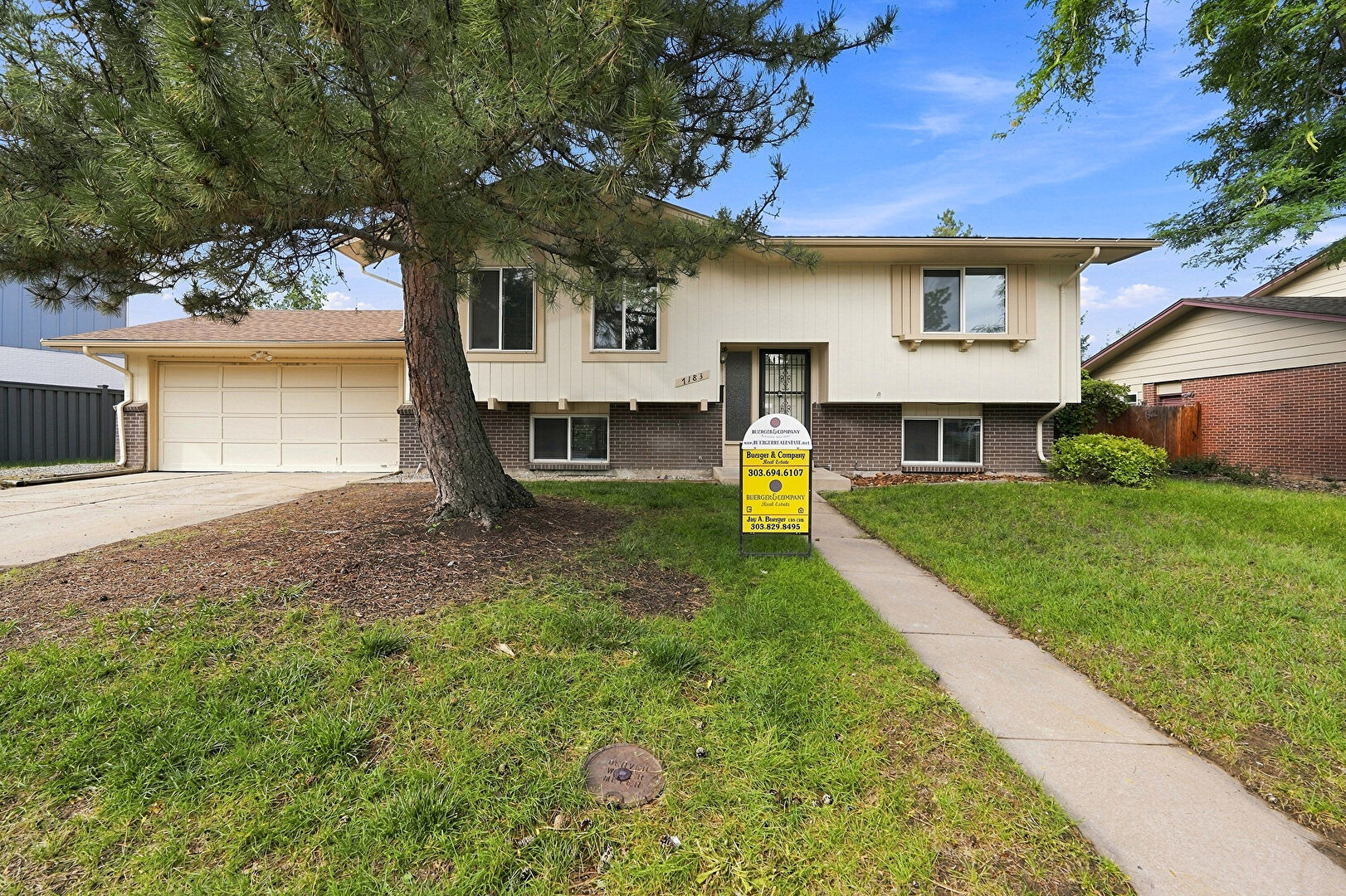 Front at 7183 South Syracuse Street, Centennial, CO 80112, listed by Jay A. Buerger