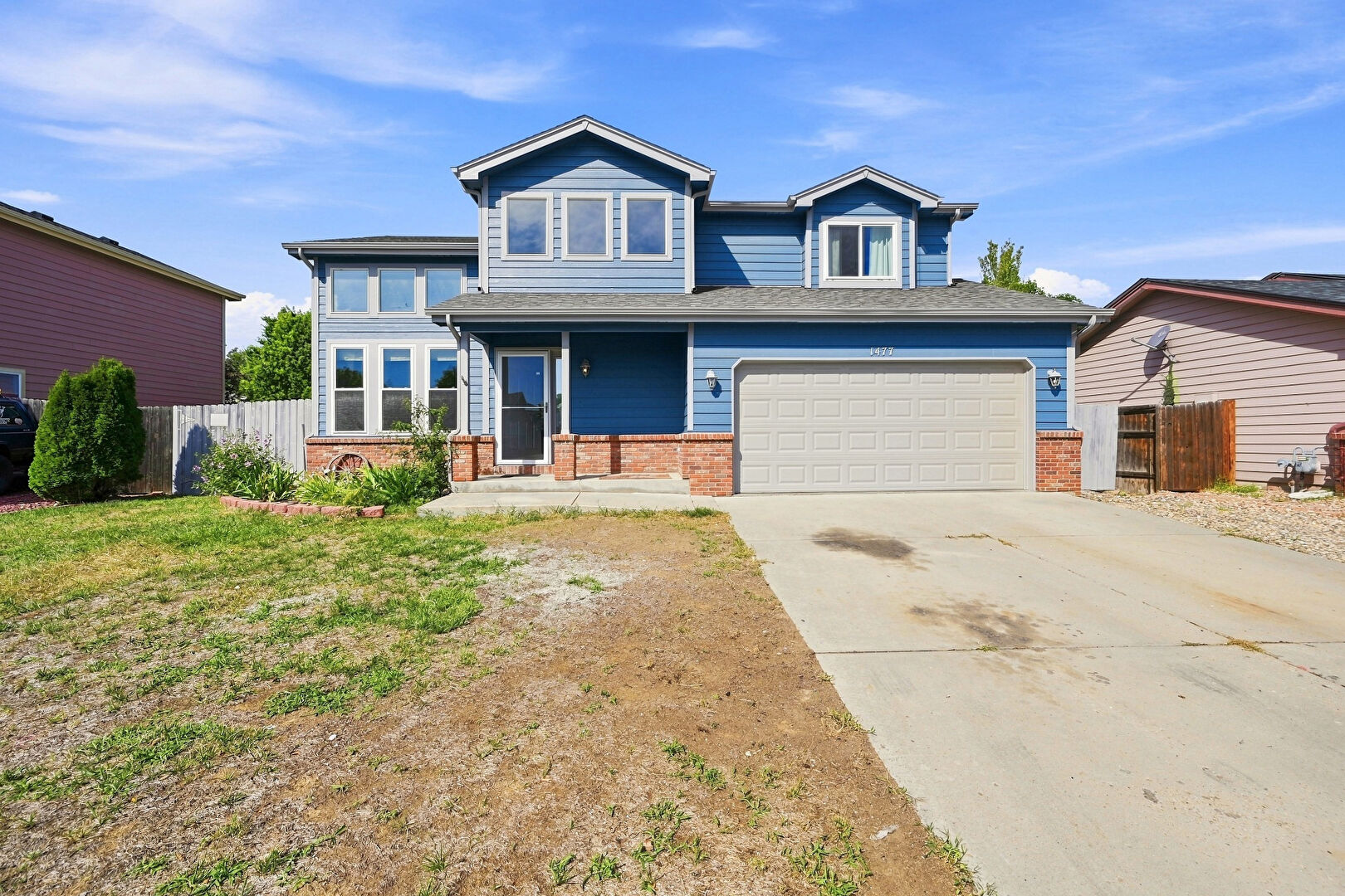 Front at 1477 South Frances Avenue, Milliken, CO 80543, listed by Leslie Blanco