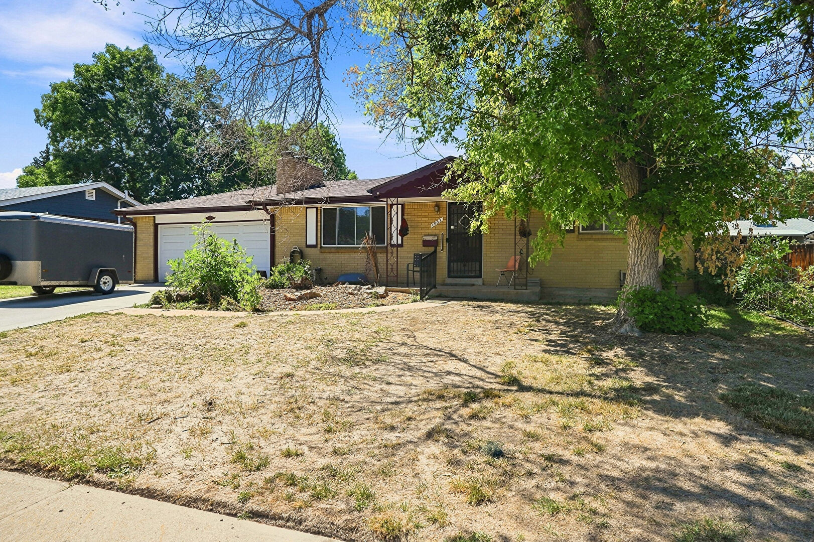 Front at 1567 South Dover Court, Lakewood, CO 80232, listed by Brandon Svitak