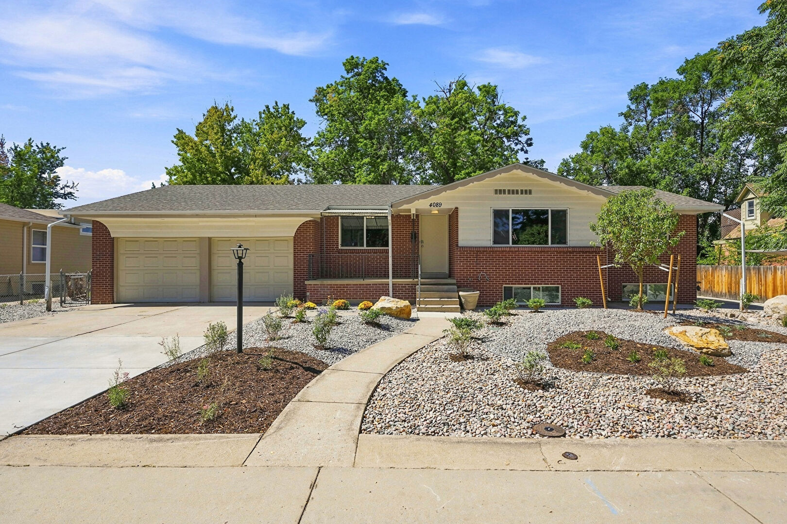 Front at 4089 Ames Street, Wheat Ridge, CO 80212, listed by Kristine Heller