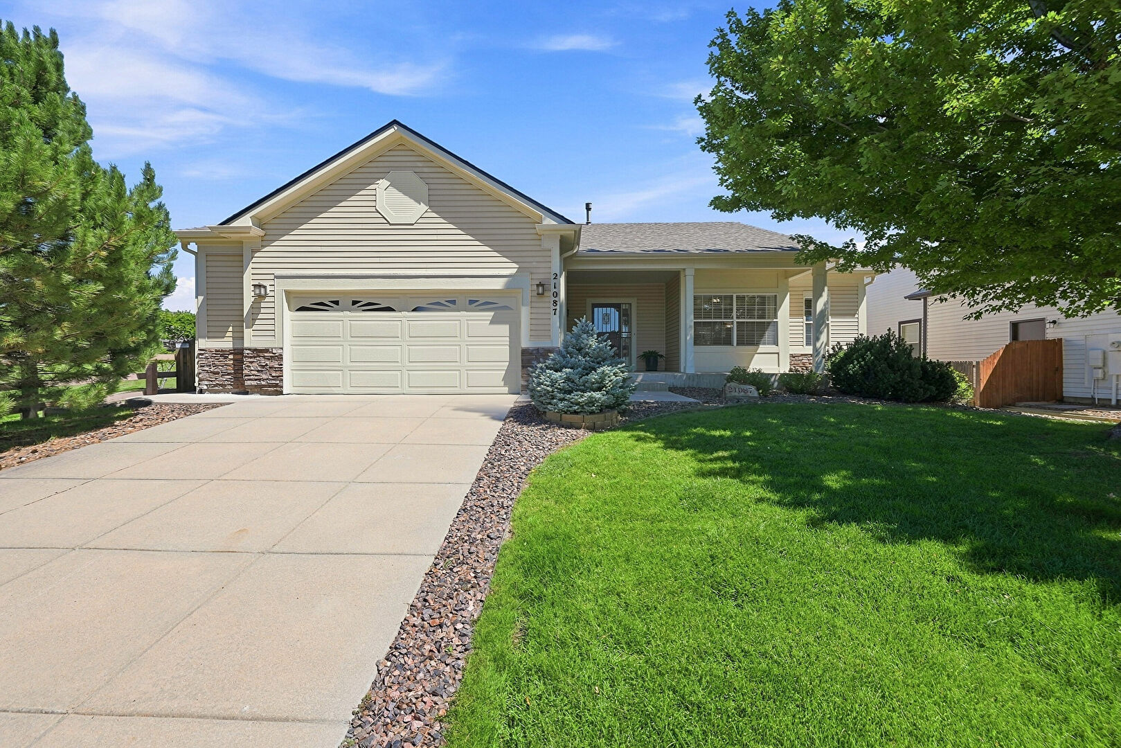 Front at 21087 Hawthorne Lane, Parker, CO 80138, listed by Rhonda Bliss-Matthews