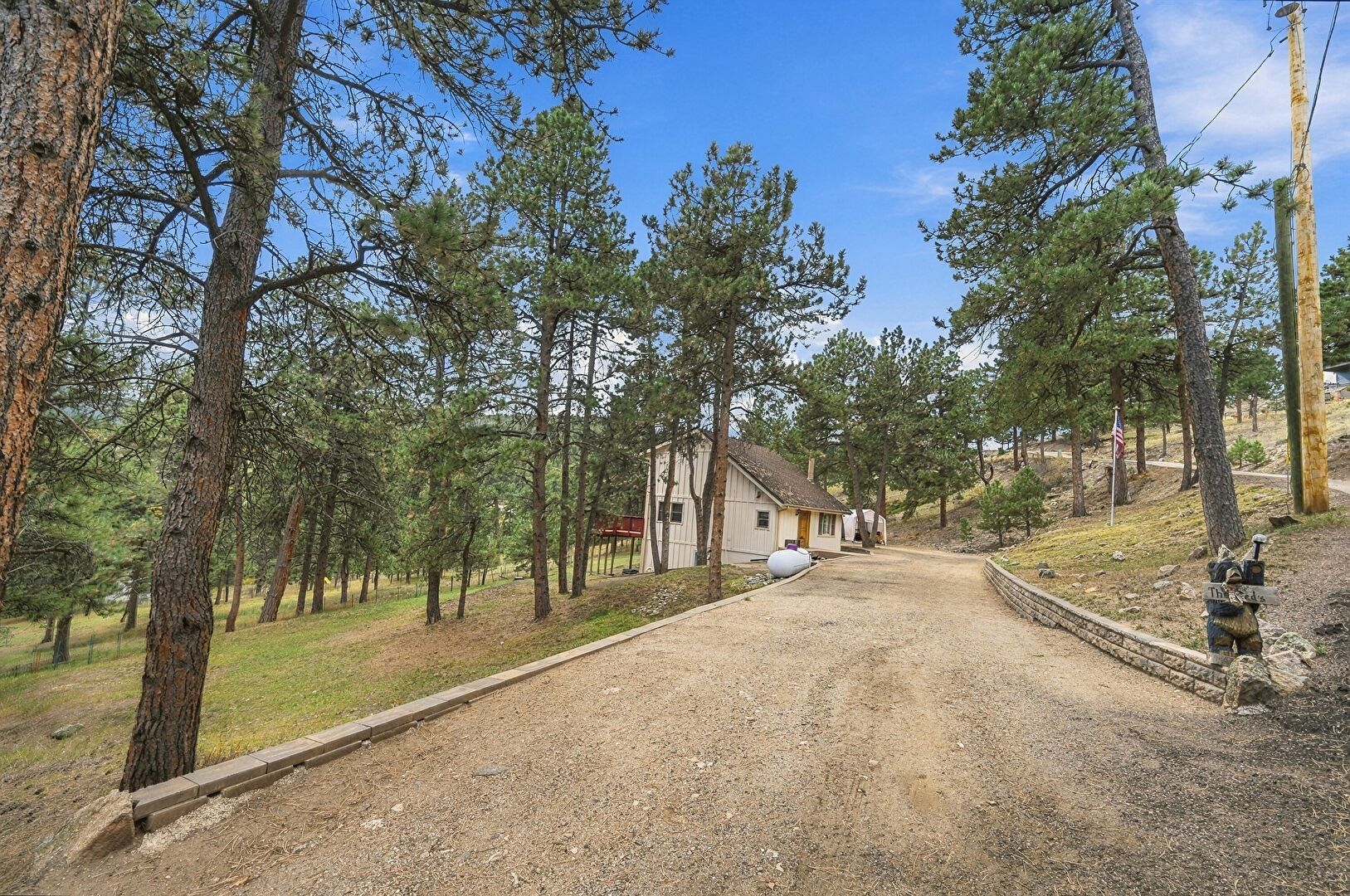 Front at 7364 South Heiter Hill Drive, Evergreen, CO 80439, listed by Ronald Federico