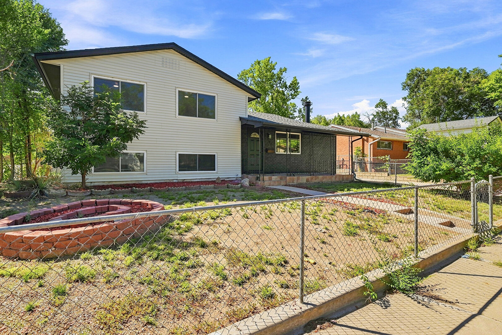 Front at 624 Bryce Drive, Colorado Springs, CO 80910, listed by Creedance Weiss