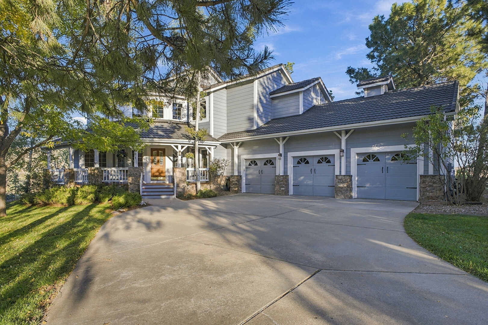 Front at 1 Meadow Rose Lane, Littleton, CO 80127, listed by Pandora & John Erlandson