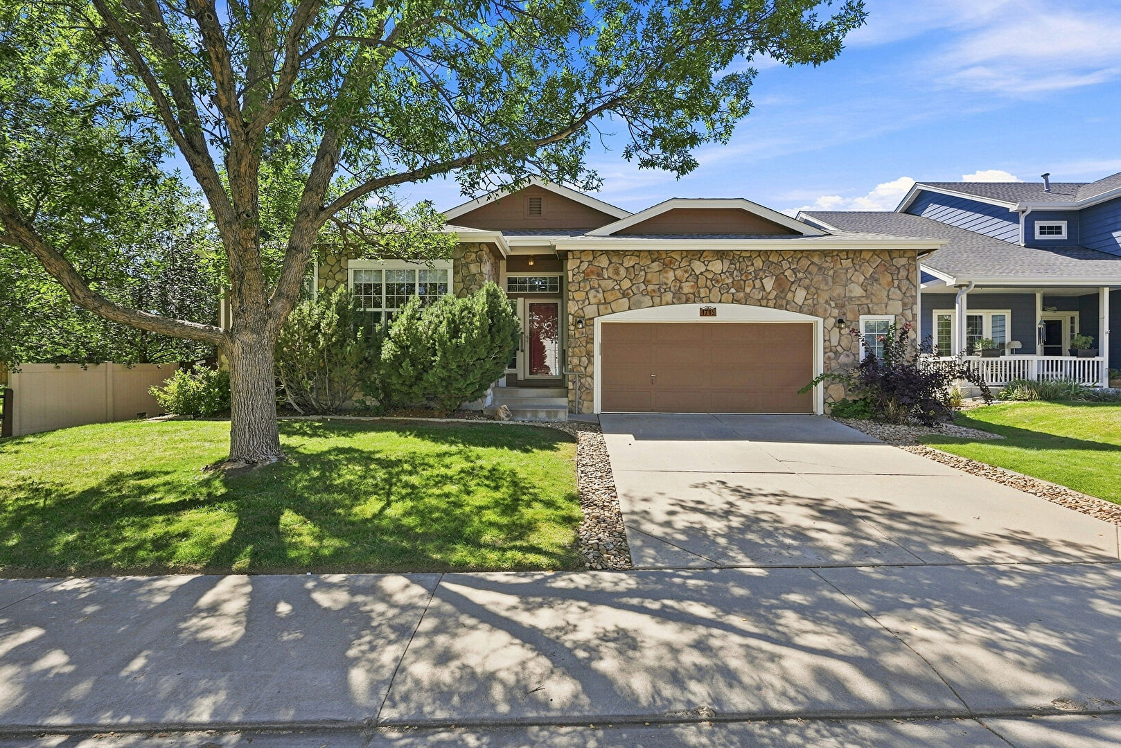 Front at 1715 Whitehall Drive, Longmont, CO 80504, listed by Dina James Young, MLS ID: 1068125