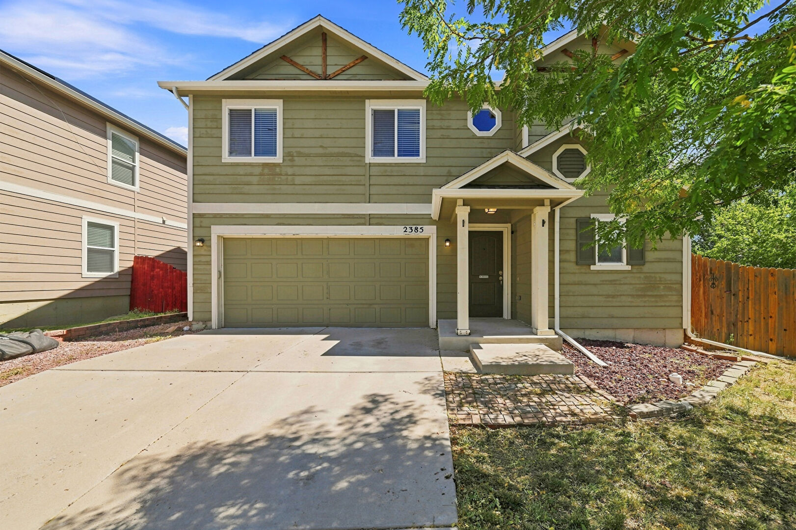 Front at 2385 Spring Blossom Dr, Colorado Springs, CO 80910, listed by Taylor Haas