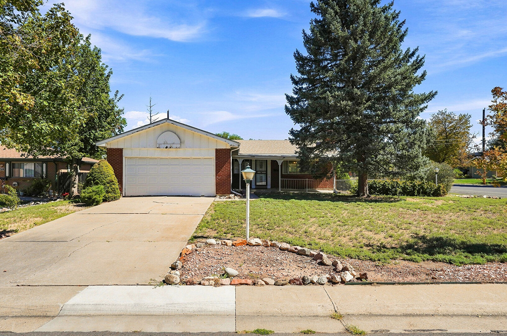 Front at 204 Tucson Street, Aurora, CO 80011, listed by Mike & Ed Hardey