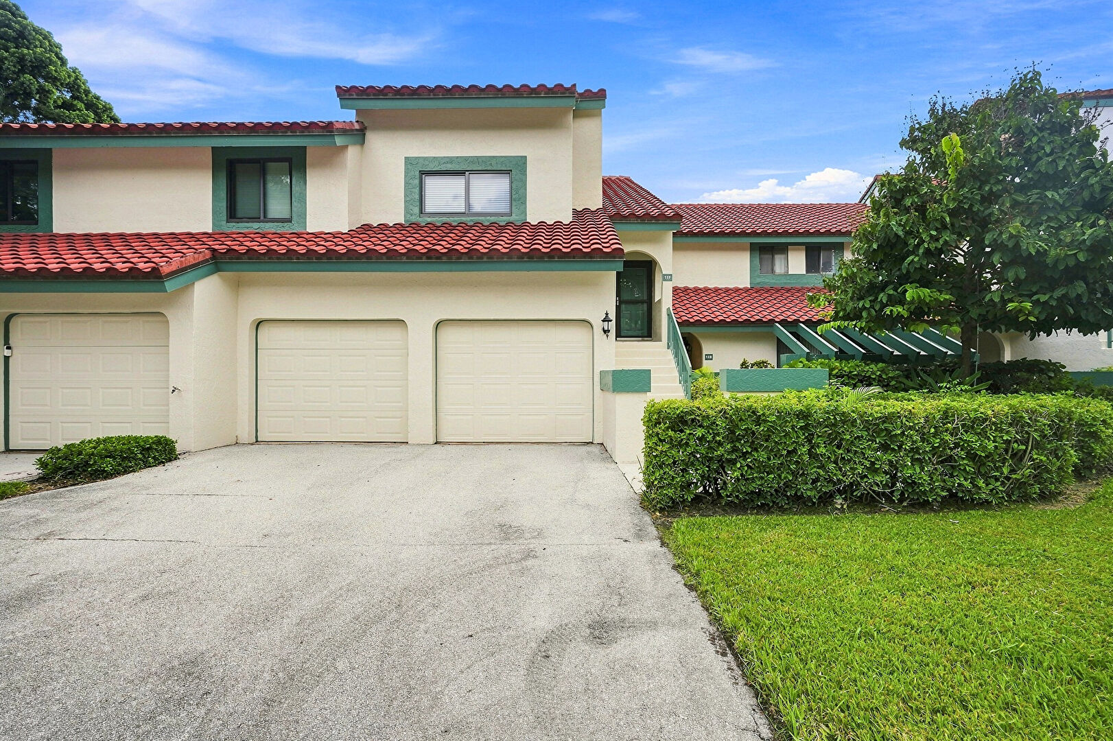 Front at 11 Lexington Lane East, B, Palm Beach Gardens, FL 33418, listed by Jonathan Triandafilou