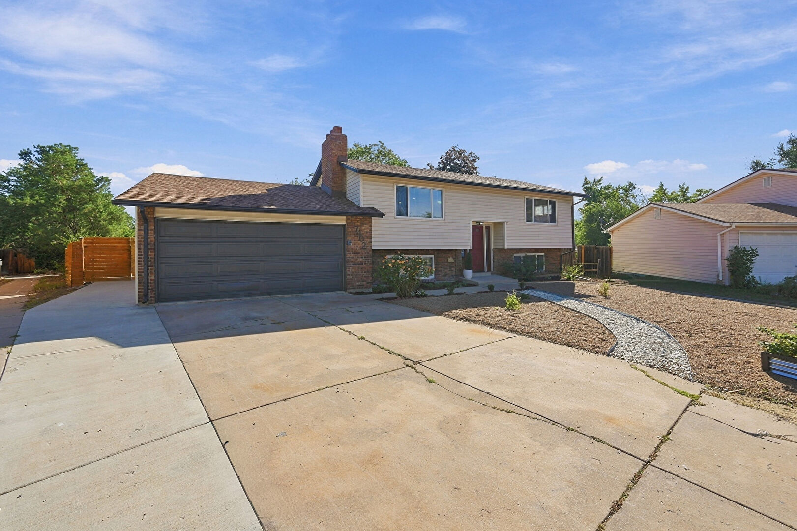 Front at 7402 South Upham Street, Littleton, CO 80128, listed by Andria and Eric Stashak