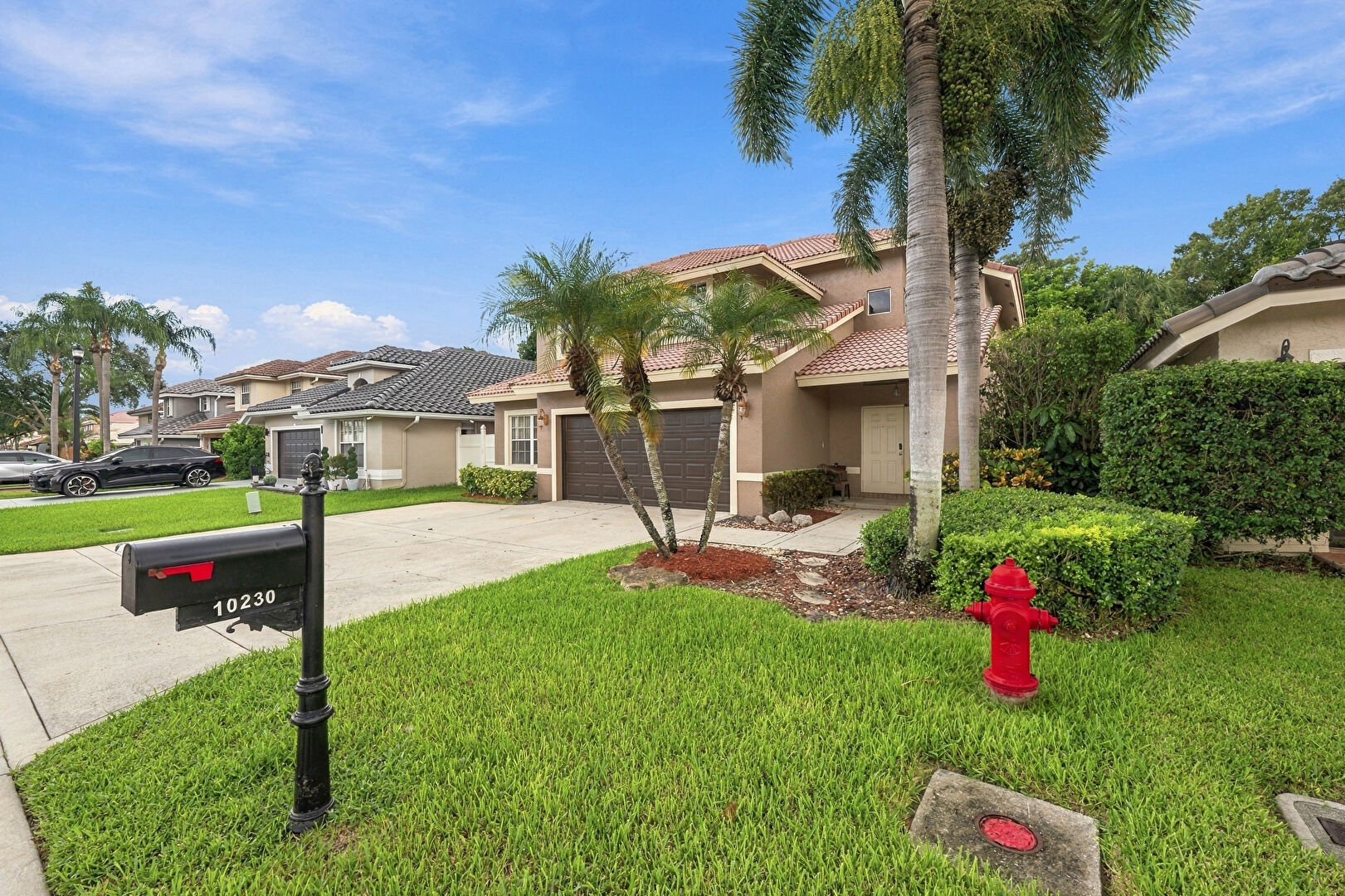 Front at 10230 Brookville Lane, Boca Raton, FL 33428, listed by Lucy Venegas