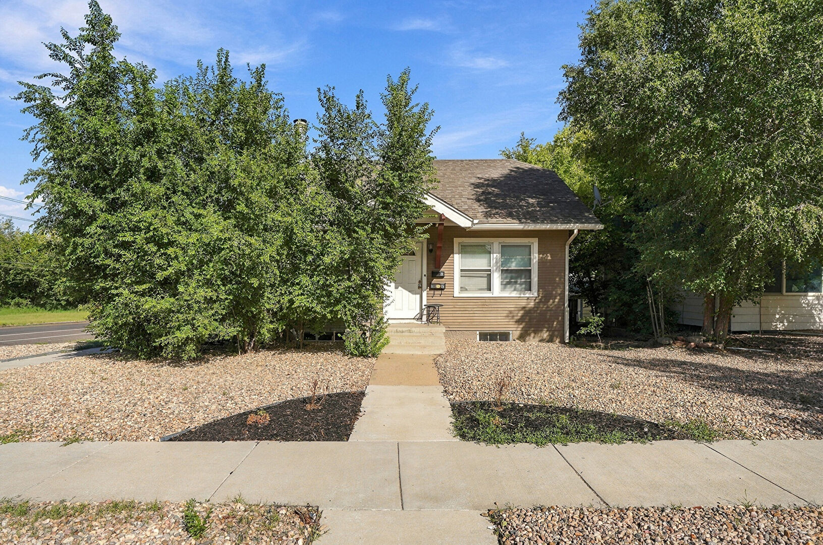Front at 1500 14th Avenue, Greeley, CO 80631, listed by Suzanne Ekeler