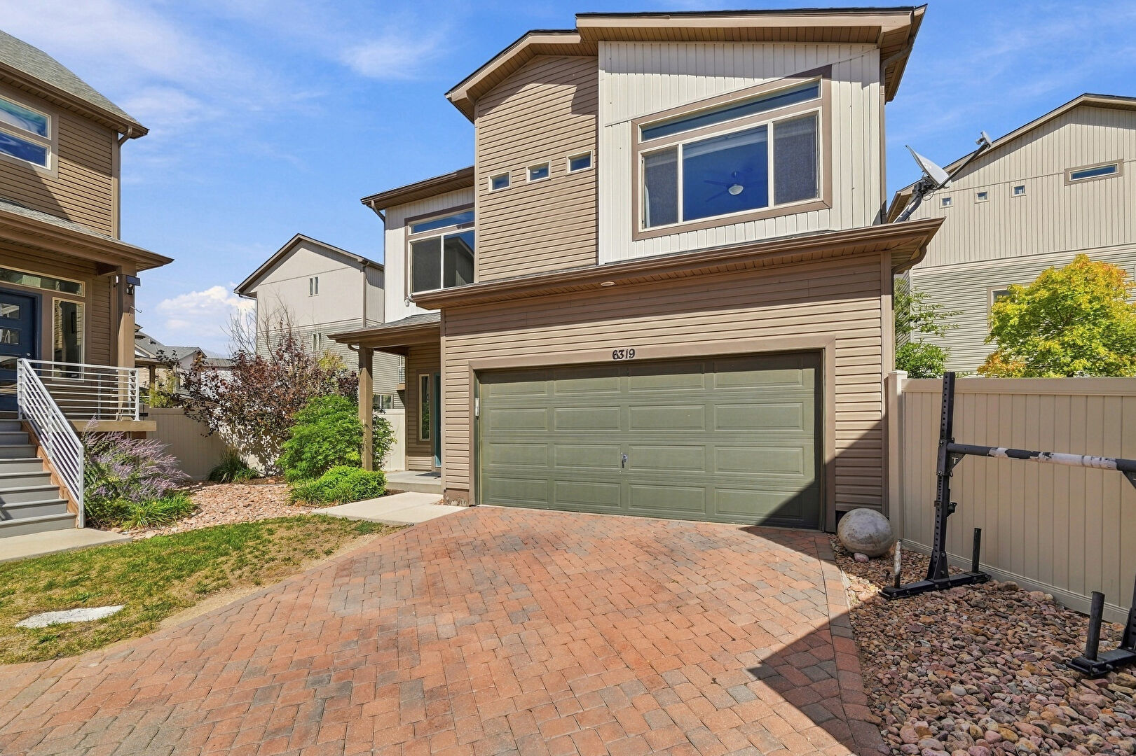 Front at 6319 John Muir Trail, Colorado Springs, CO 80927, listed by Taylor Haas