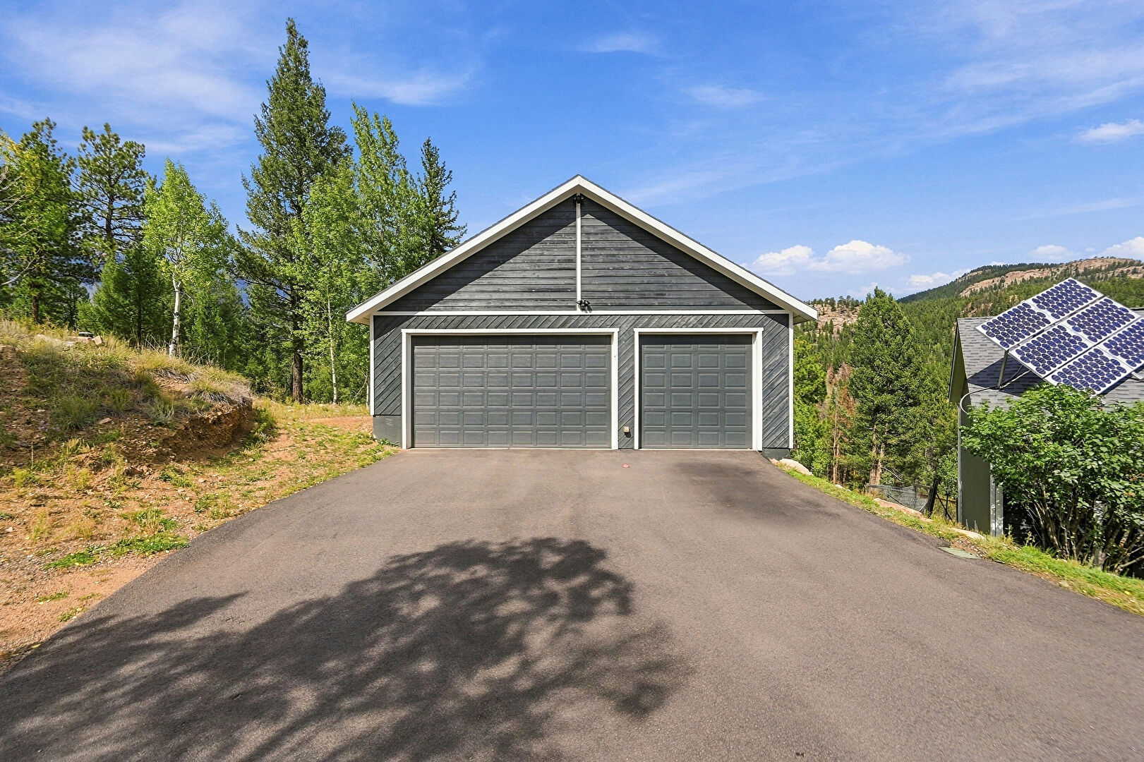 Detached Garage at 33165 Diana Road, Pine, CO 80470, listed by The Dolph Team