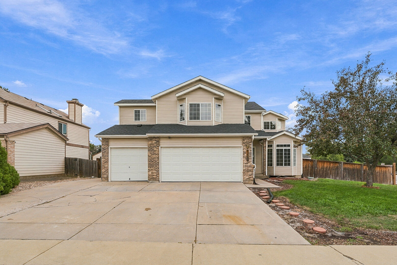 Front at 18602 East Chenango Place, Aurora, CO 80015, listed by Brianna Griffin