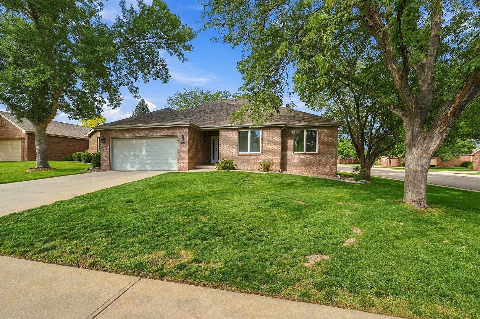 Front at 1805 44th Avenue Court, Greeley, CO 80634, listed by Kaitlyn Motschall