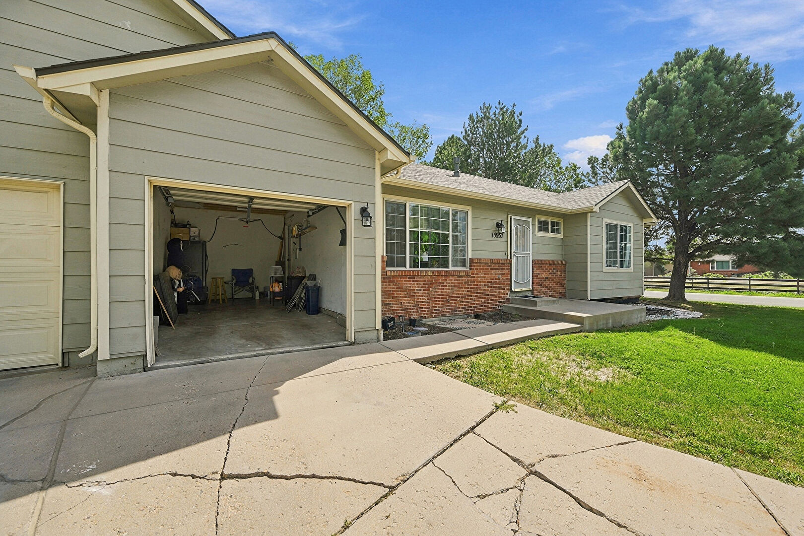 Front at 15937 E 13th Ave, Aurora, CO 80011, listed by Luxe Home Group