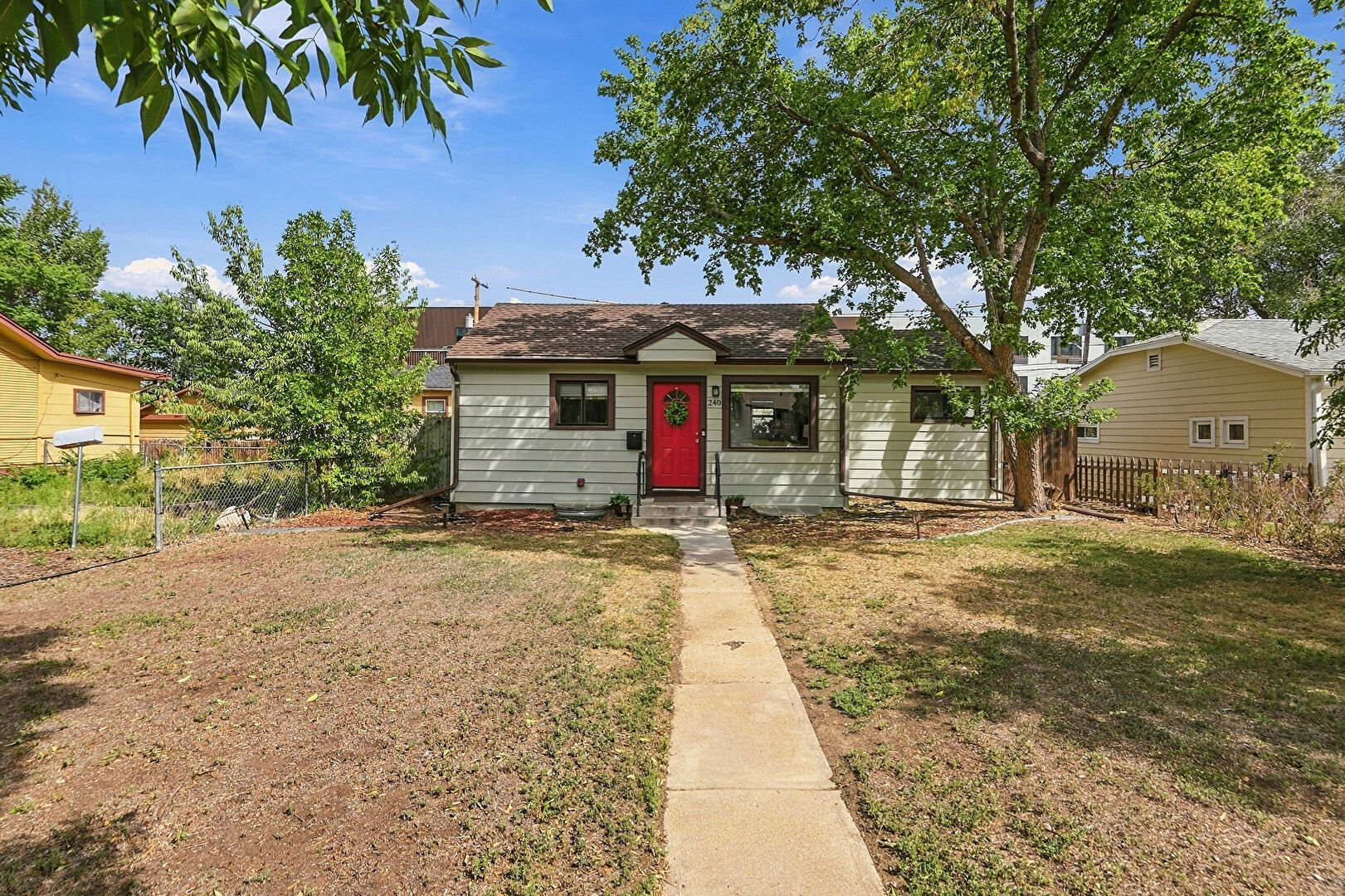 Front at 240 Grove Street, Denver, CO 80219, listed by Quinn Sabatini