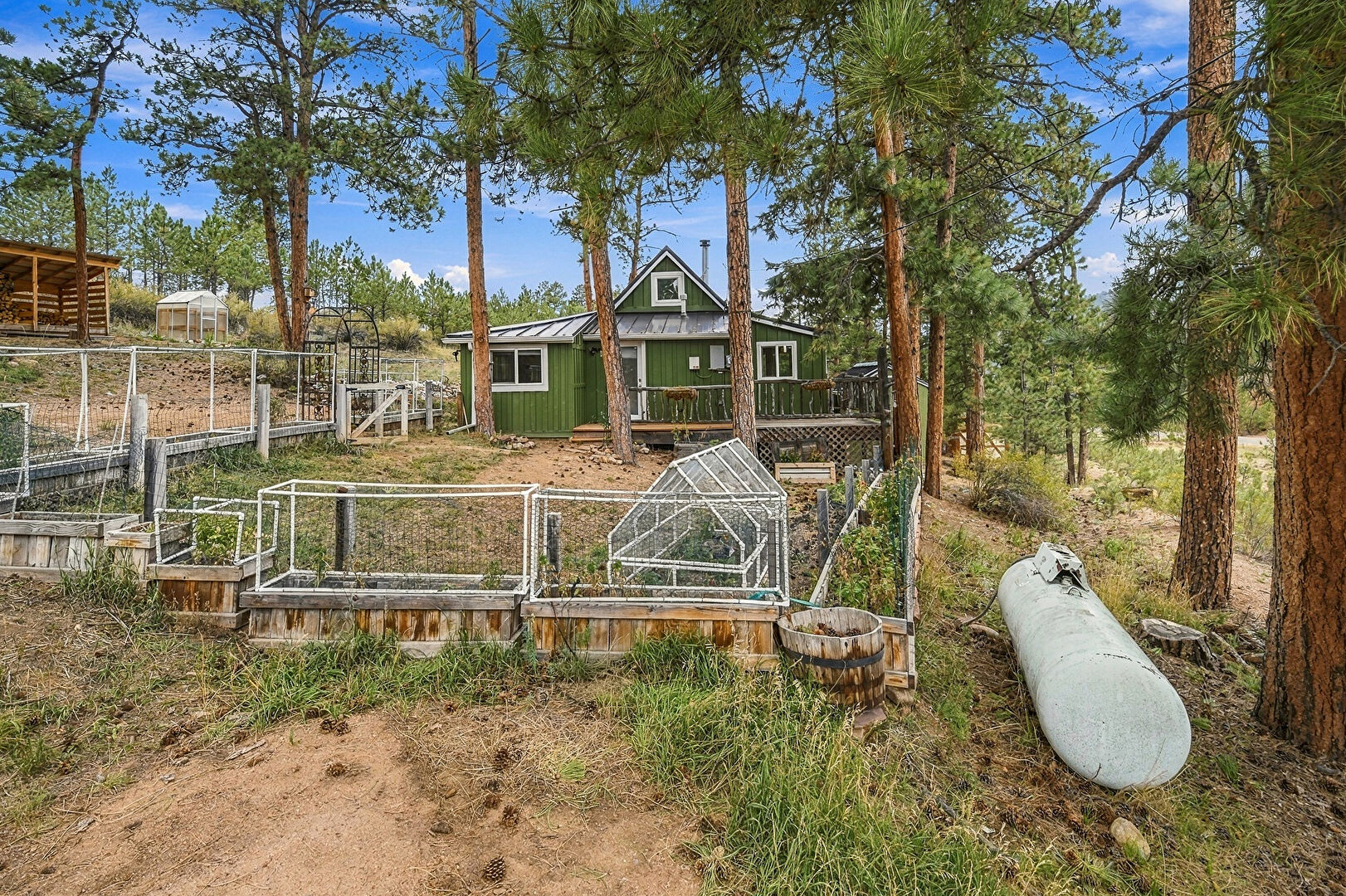 Front at 23804 Logan Avenue, Pine, CO 80470, listed by Joel Uhler, MLS ID: 8130445