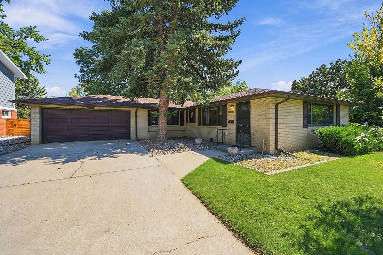 Front at 1220 Sherman Street, Longmont, CO 80501, listed by Leslie Lubovich