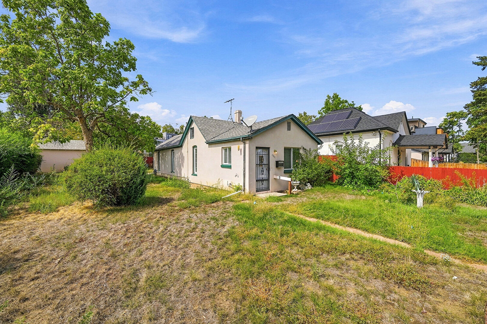 Front yard at 4207 Mariposa Street, Denver, CO 80211, listed by Josh Larsen
