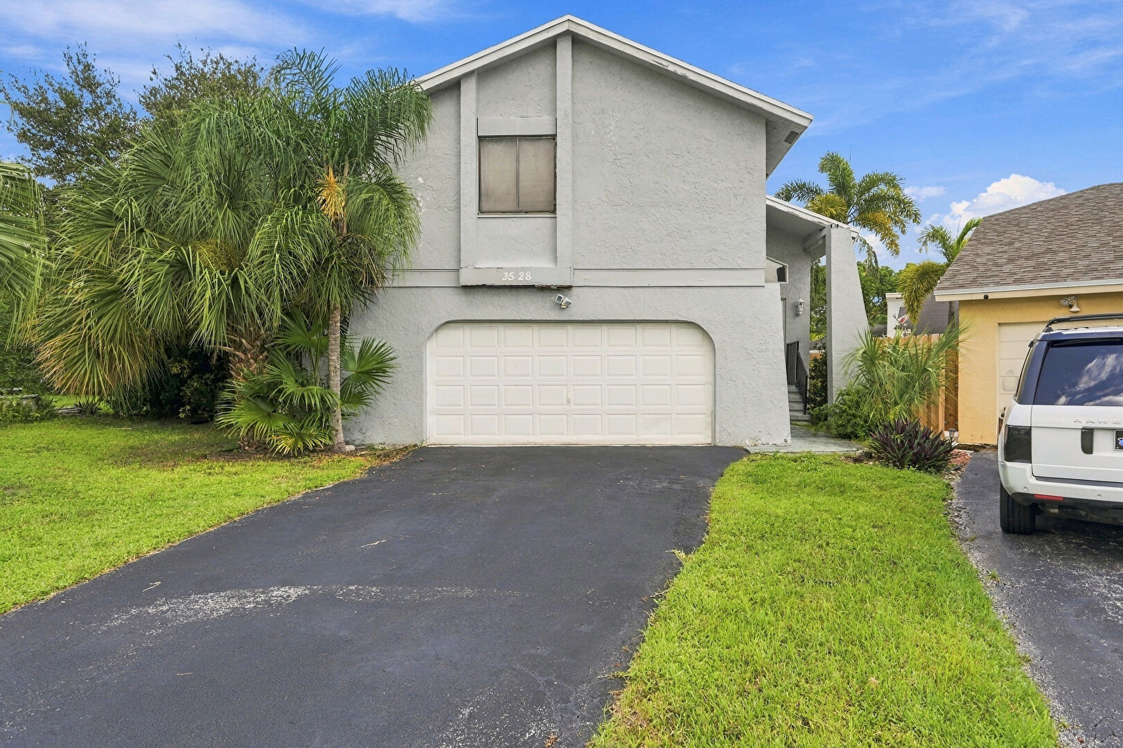 Front at 3528 Northwest 73rd Way, Coral Springs, FL 33065, listed by Eslin Guice