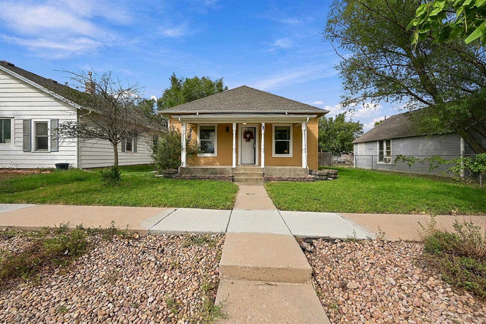 Front at 18 Elm Street, Windsor, CO 80550, listed by Suzanne Ekeler