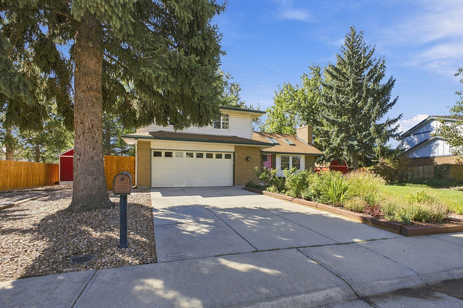 Front at 10836 West 77th Avenue, Arvada, CO 80005, listed by Nicole Hanson