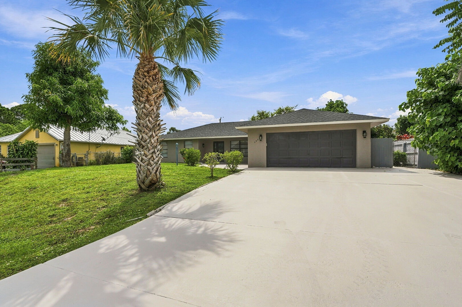 Front at 680 Southwest Colleen Avenue, Port St. Lucie, FL 34983, listed by William Torres