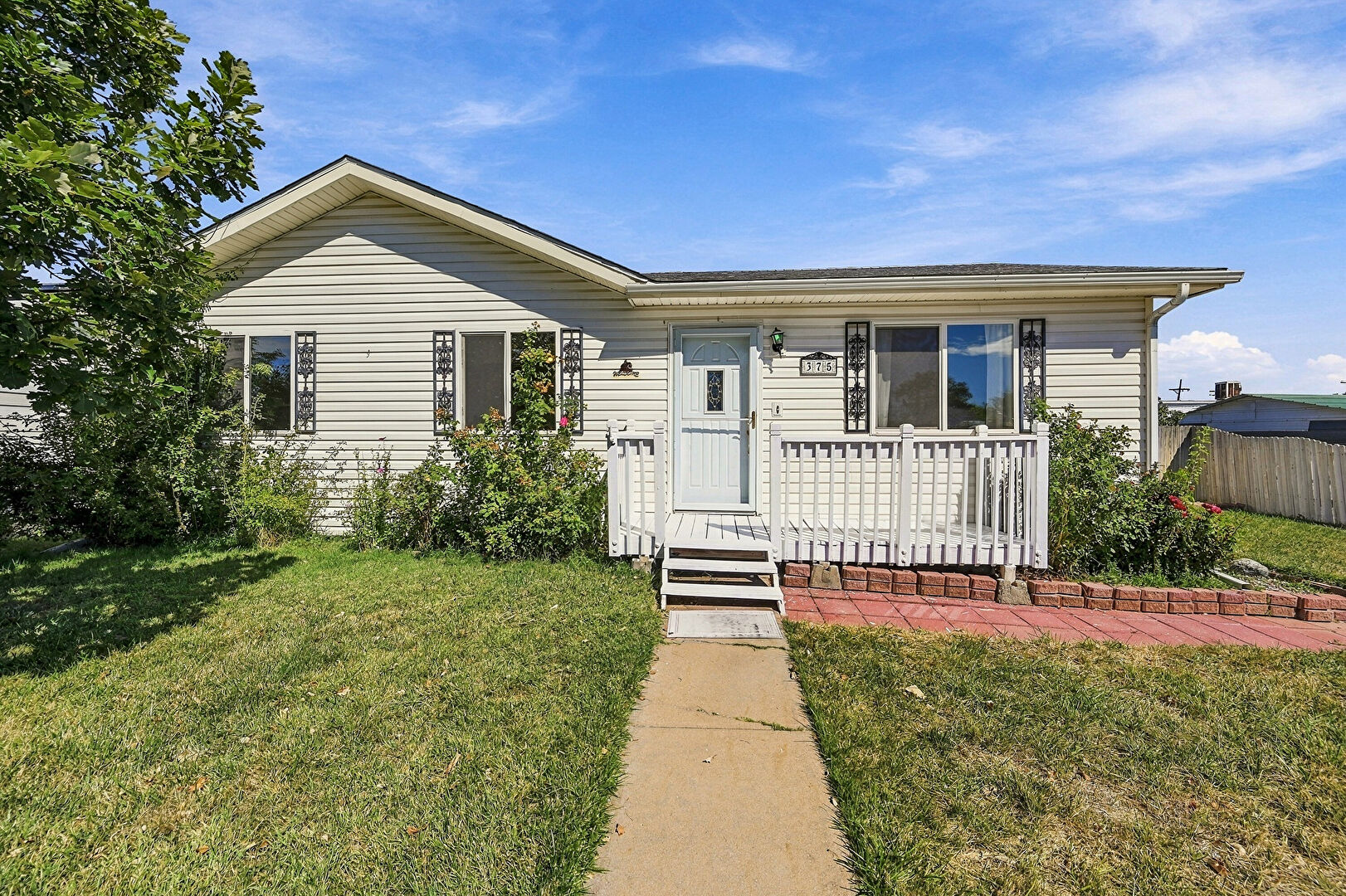 Front at 375 Kipp Avenue, Keenesburg, CO 80643, listed by Jessica McAnally
