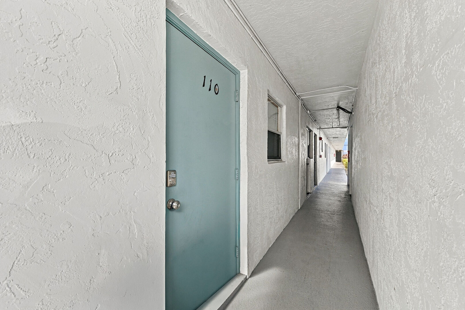 Exterior Entry at 4311 Crystal Lake Drive, Unit 110, Pompano Beach, FL 33064, listed by Mervin Moss