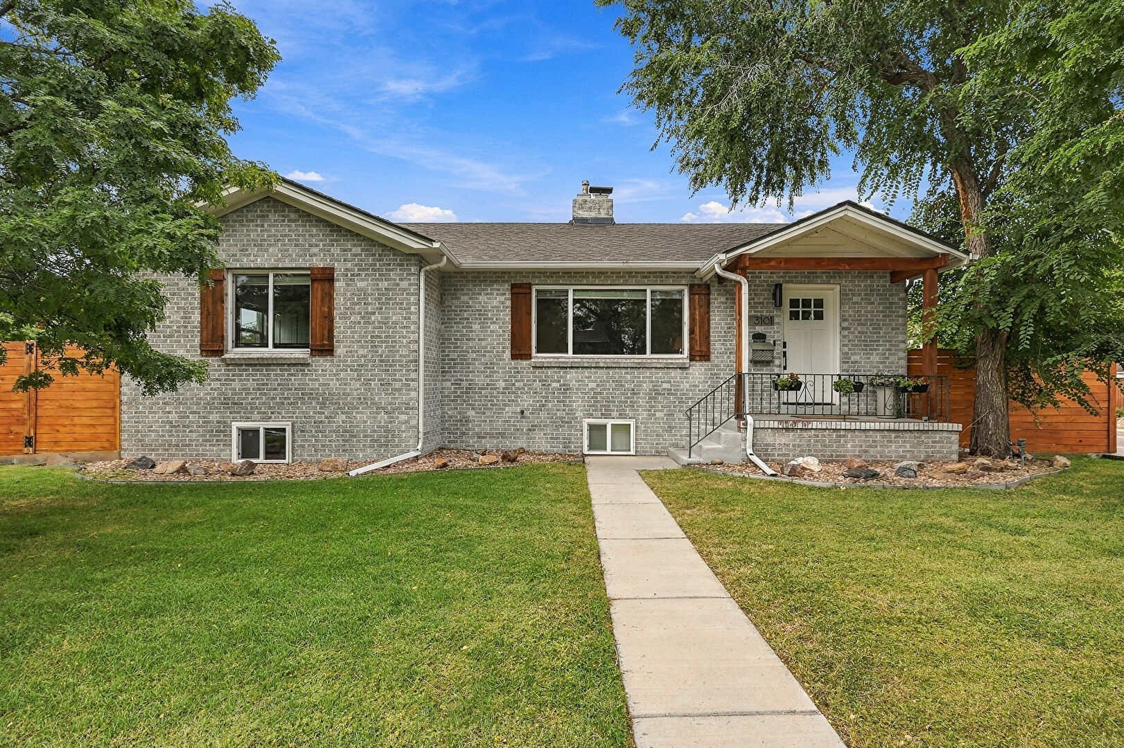 Front at 3101 South Logan Street, Englewood, CO 80113, listed by Kenny Smith