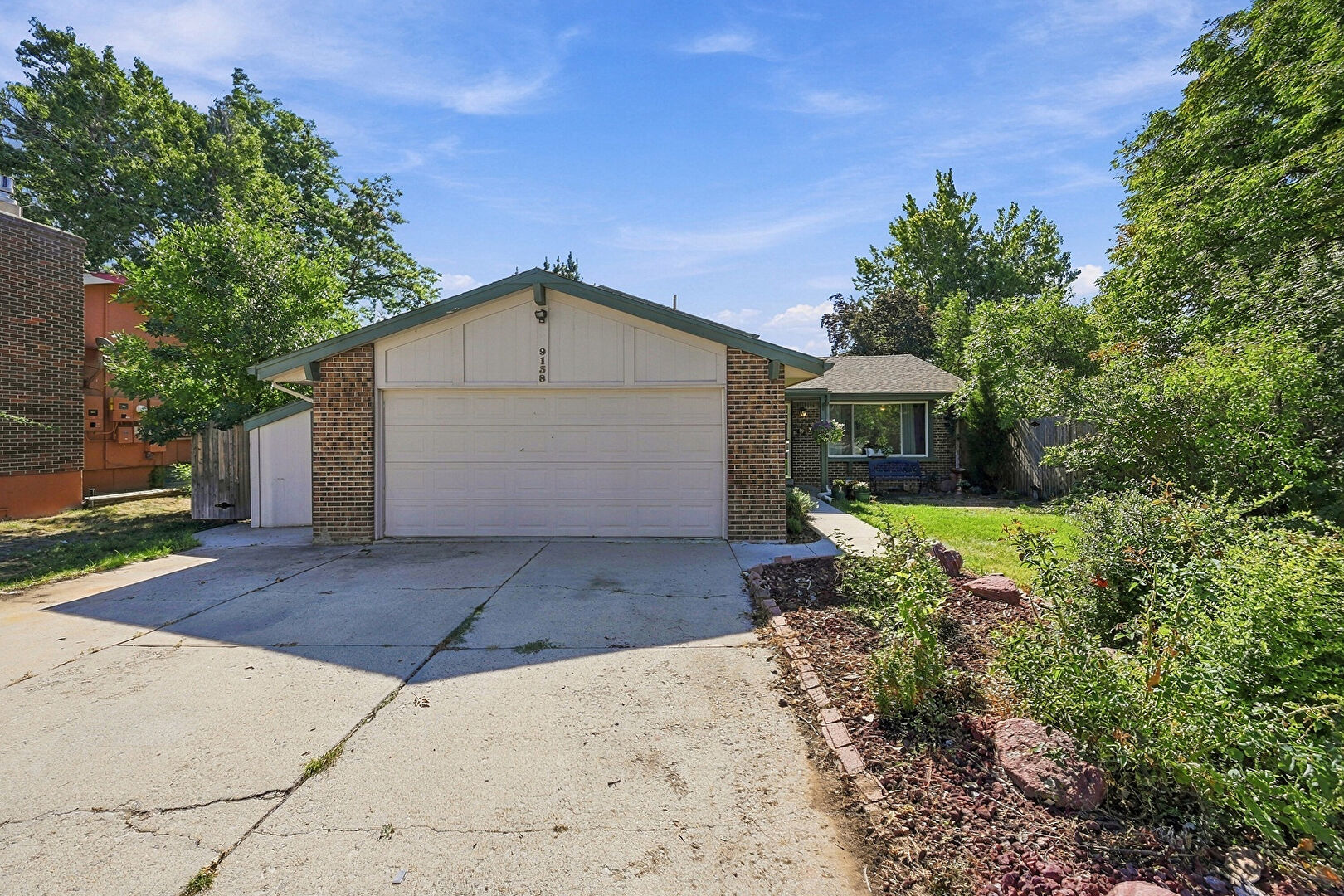 Front at 9138 West 77th Place, Arvada, CO 80005, listed by Eric Carlton