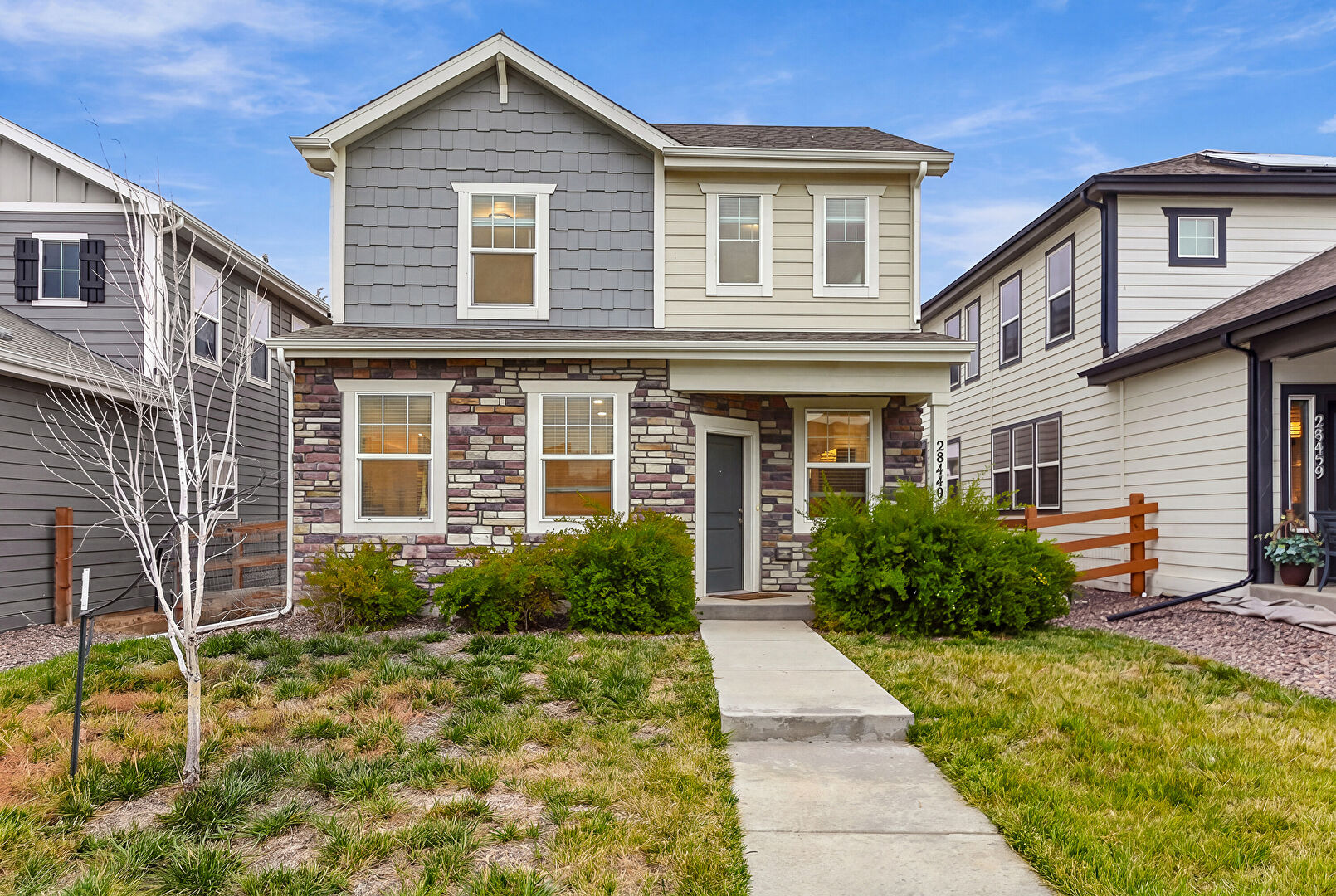 Front at 28449 East 8th Avenue, Watkins, CO 80137, listed by Sagine Israel