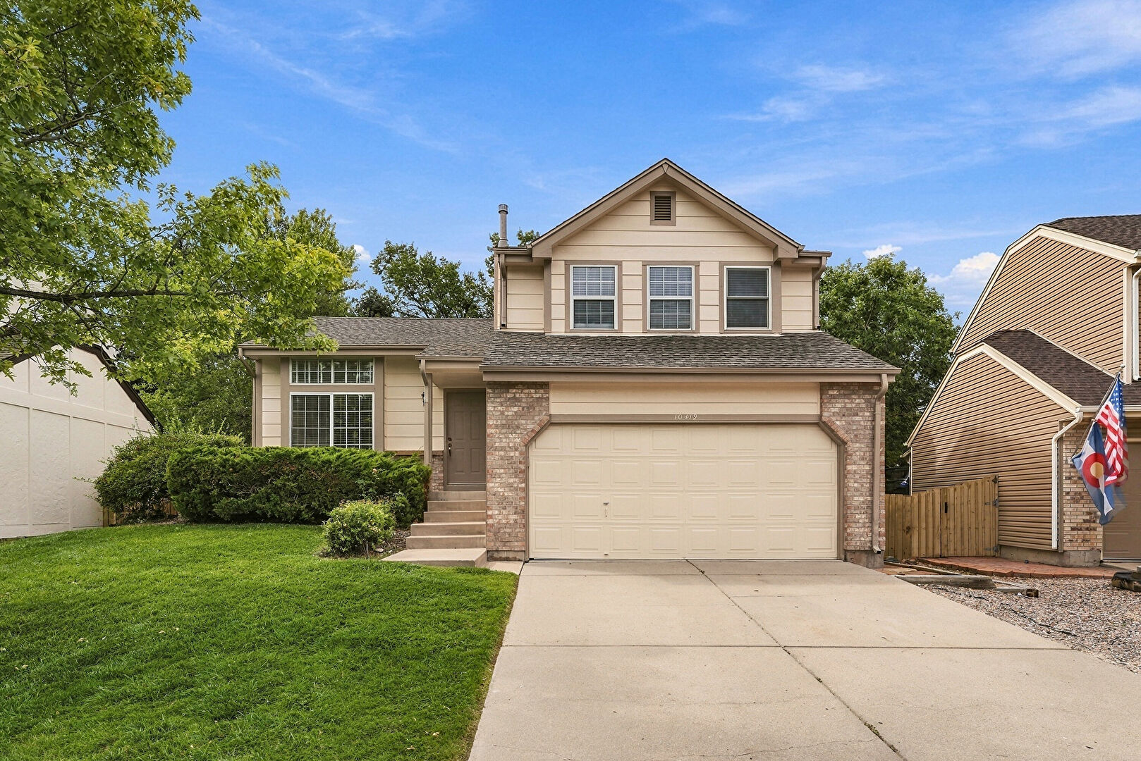Front at 10419 Strasburg Way, Parker, CO 80134, listed by Ted Peterson Care Real Estate