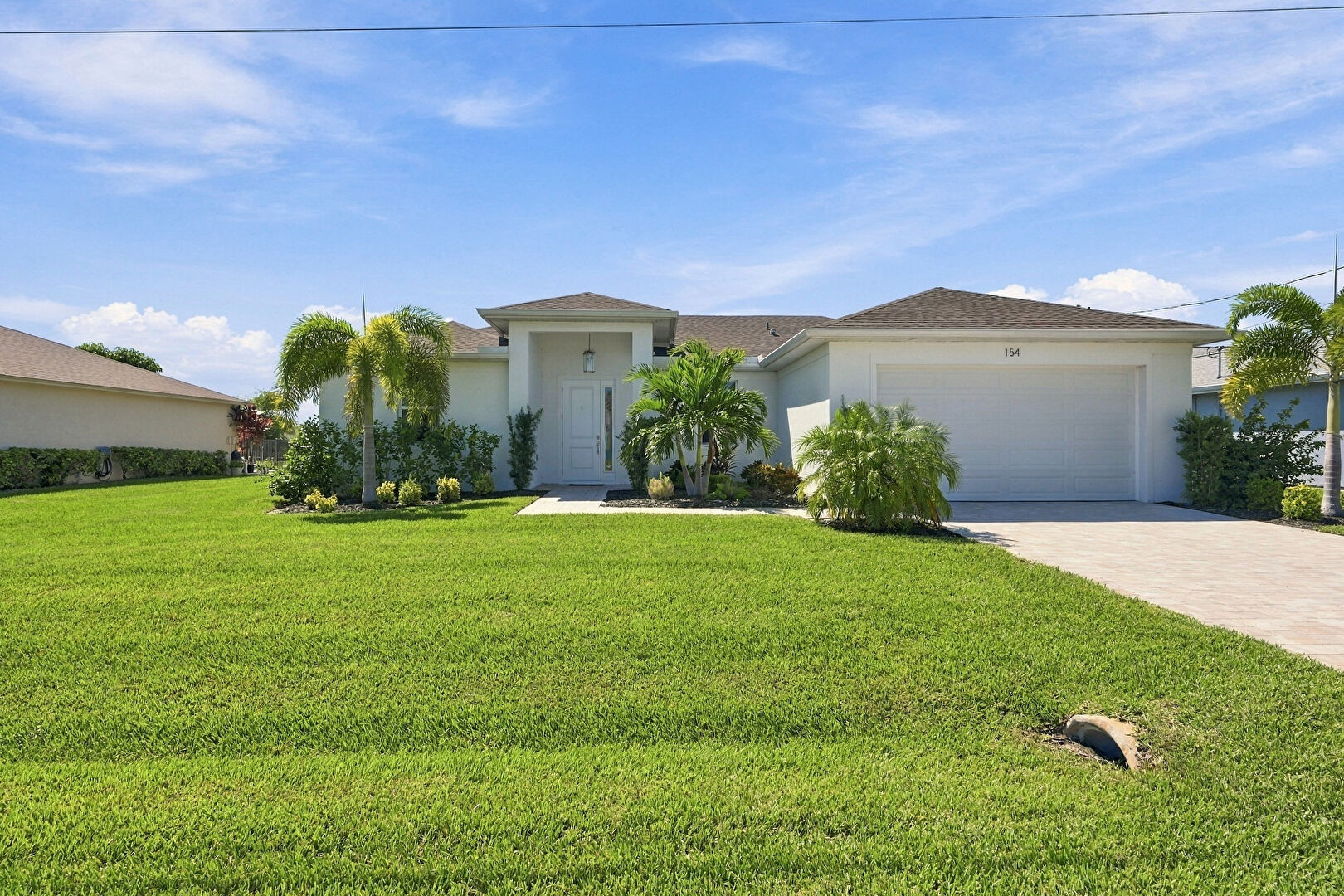 Front at 154 Southeast 20th Street, Cape Coral, FL 33990, listed by Brett Crume