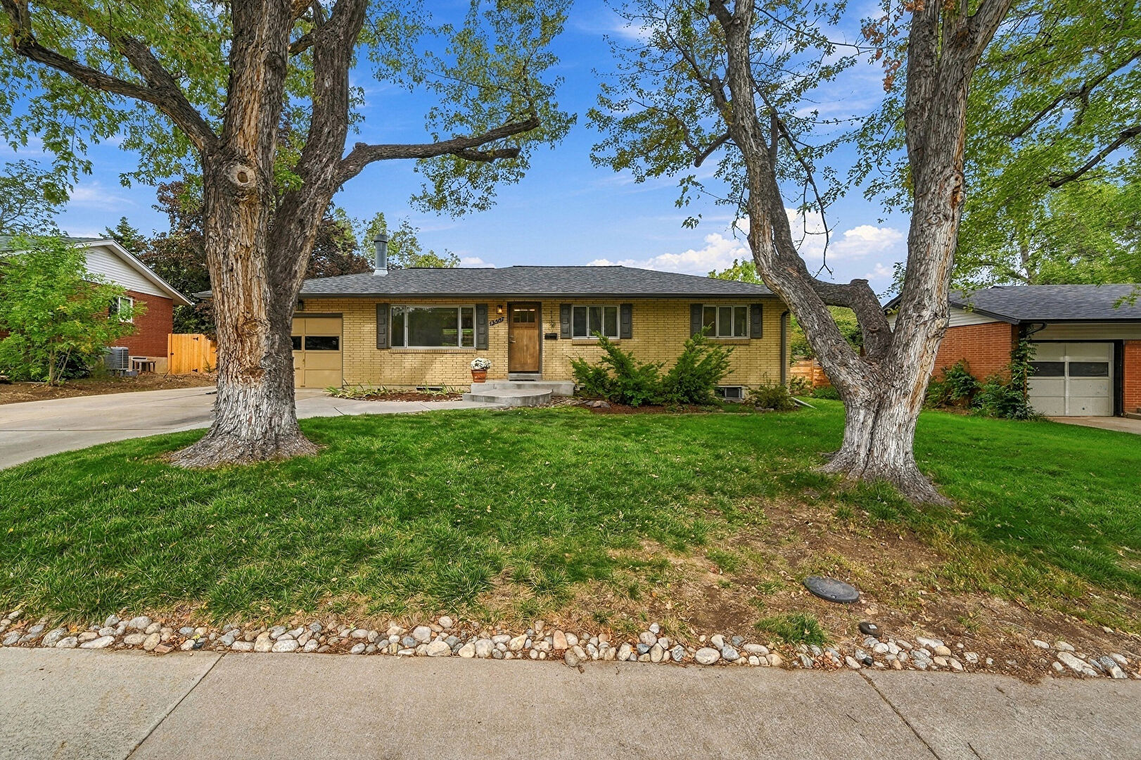 Front yard view at 13587 West 22nd Place, Golden, CO 80401, listed by Kathi Miller, MLS ID: 8246786