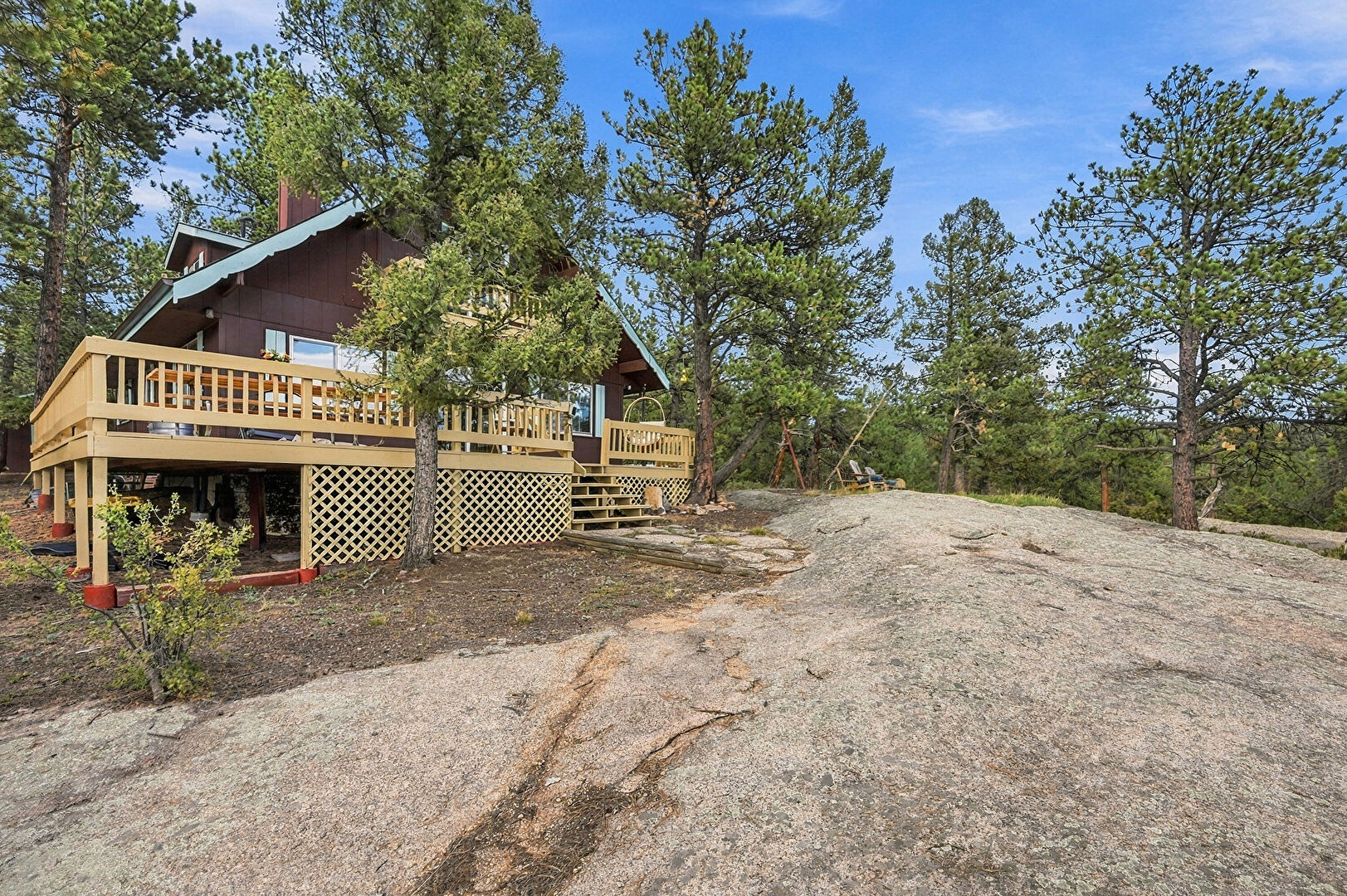 Front at 237 Road B, Pine, CO 80470, listed by The Dolph Team
