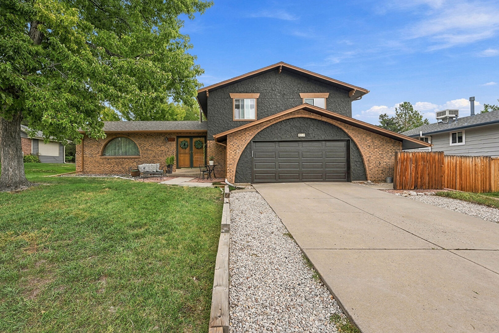 Front at 5319 West Roxbury Place, Littleton, CO 80128, listed by Jennifer Dentry