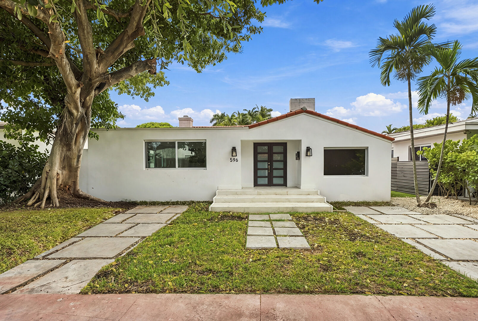 Front at 596 West 50th Street, Miami Beach, FL 33140, listed by Howard Chase