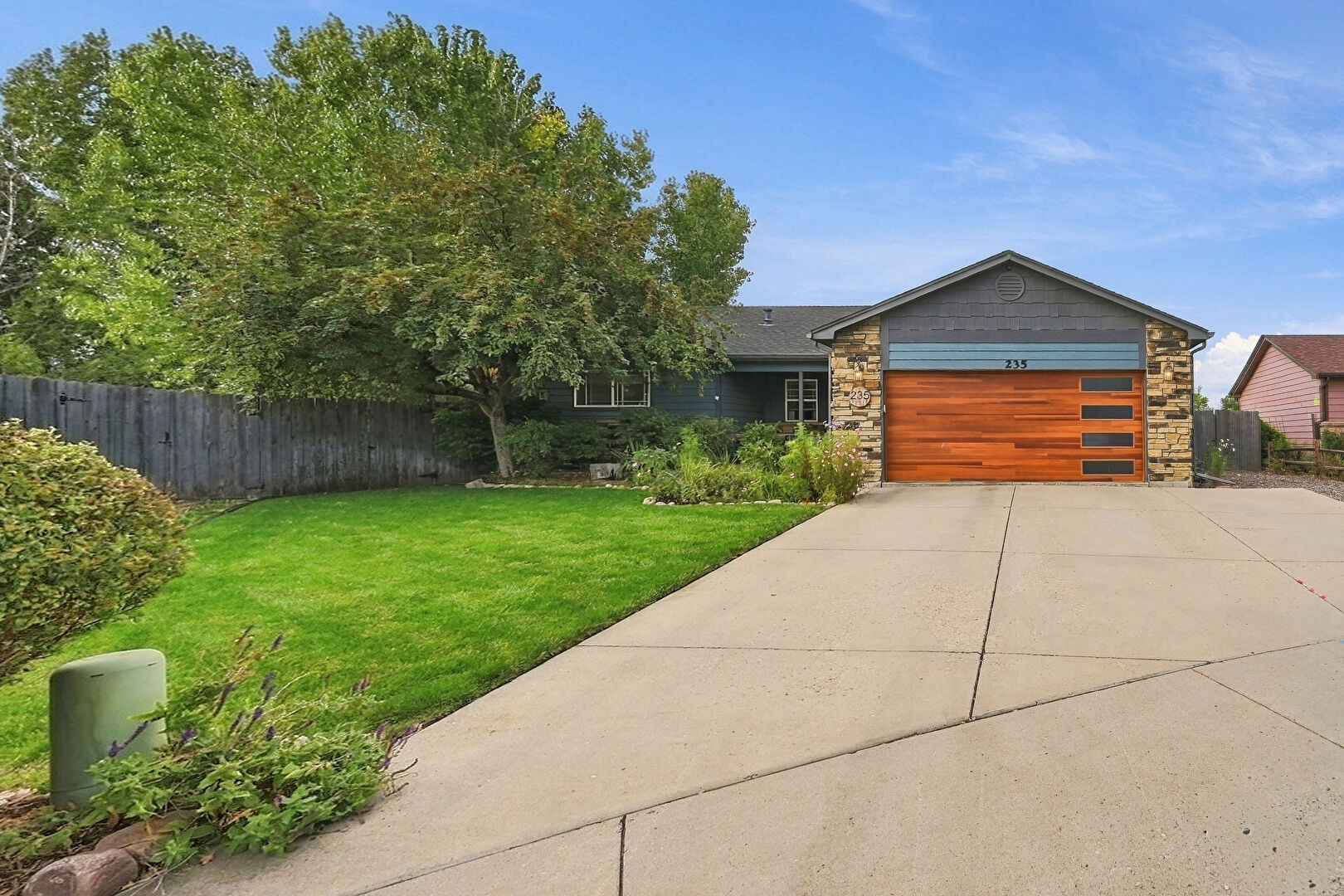 Front at 235 Topaz Court, Windsor, CO 80550, listed by Tabatha McClure