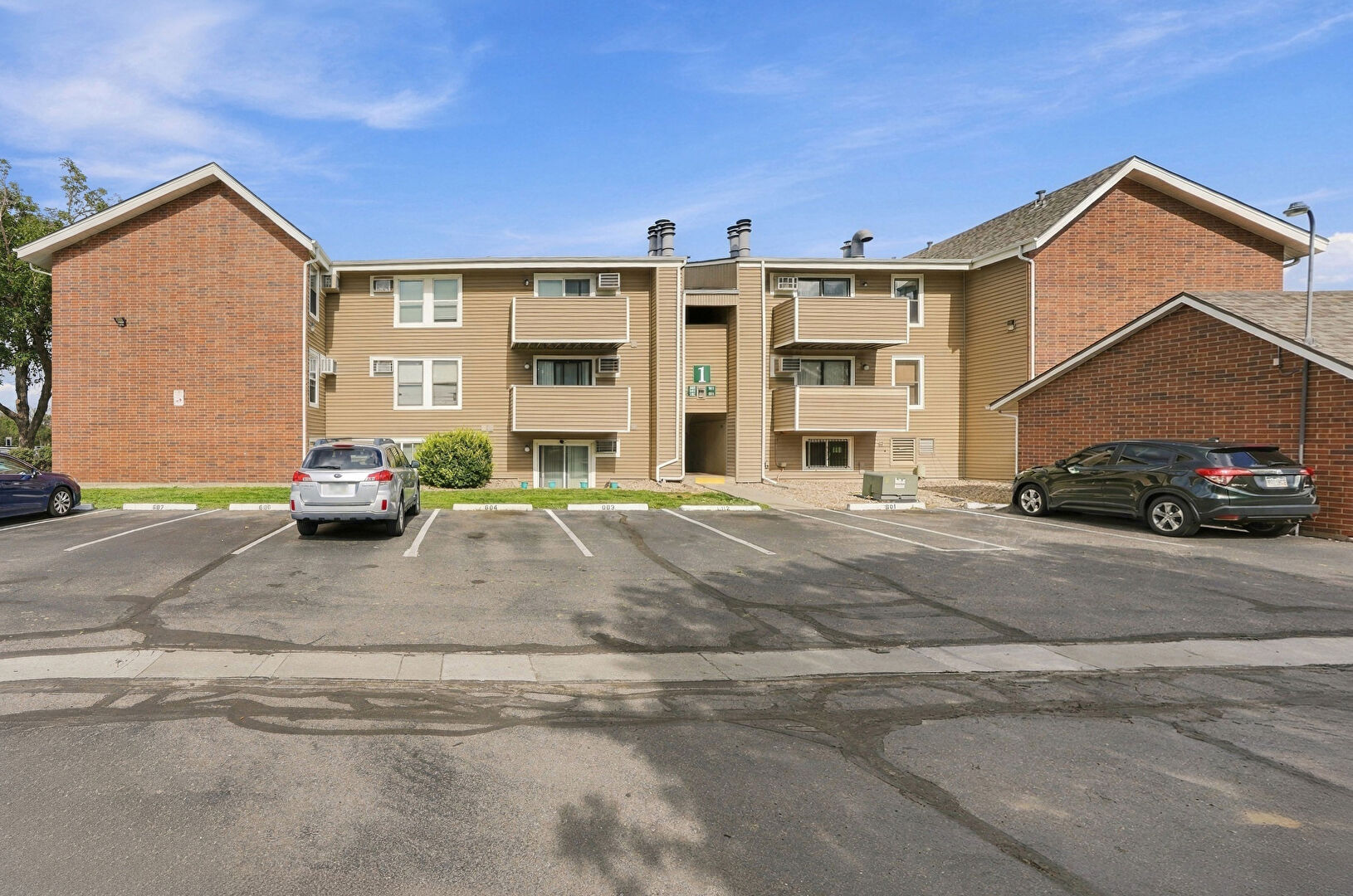 Front at 10150 East Virginia Avenue, Bdg 1 #306, Denver, CO 80247, listed by Danielle Marcus