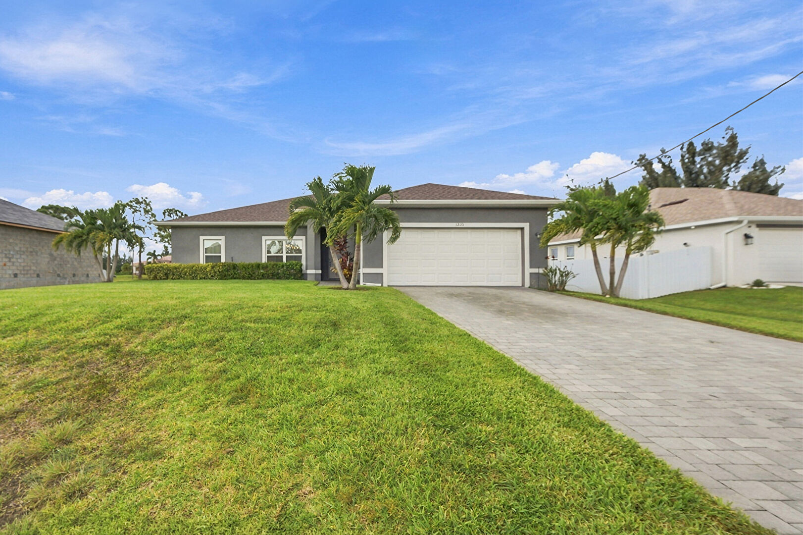 Front at 3225 Northwest 21st Street, Cape Coral, FL 33993, listed by Livia Nemes