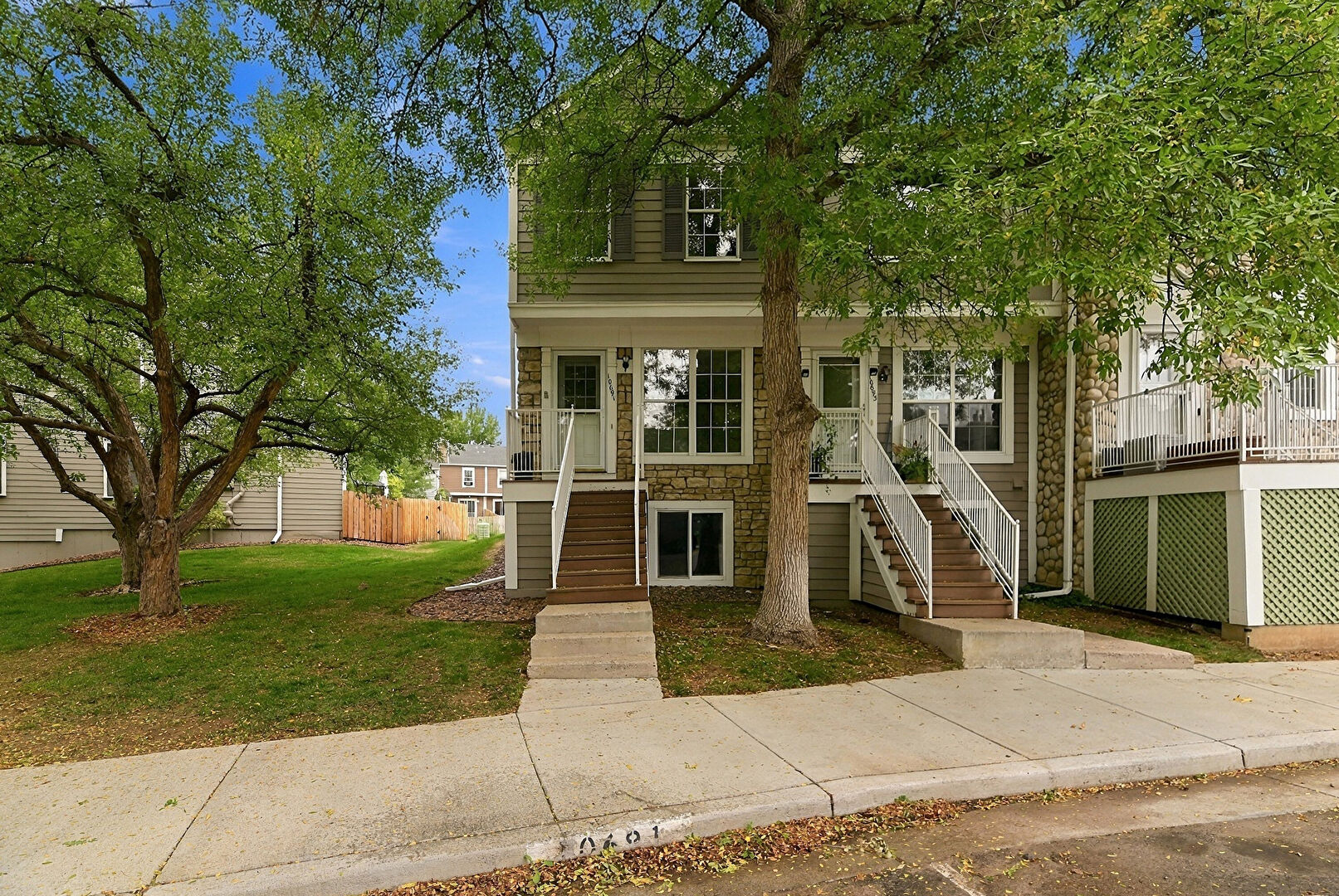 Front at 10691 West Dartmouth Avenue, Lakewood, CO 80227, listed by Taylor Haas