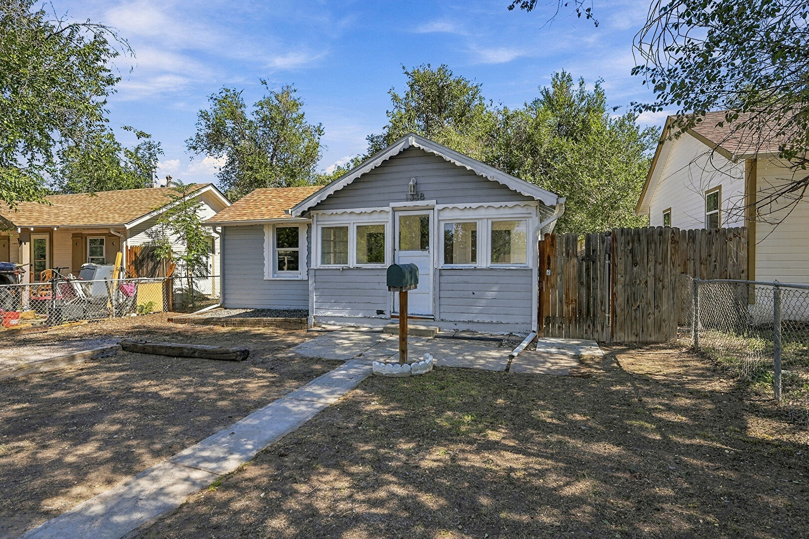Front at 1338 Iola Street, Aurora, CO 80010, listed by Taylor Haas
